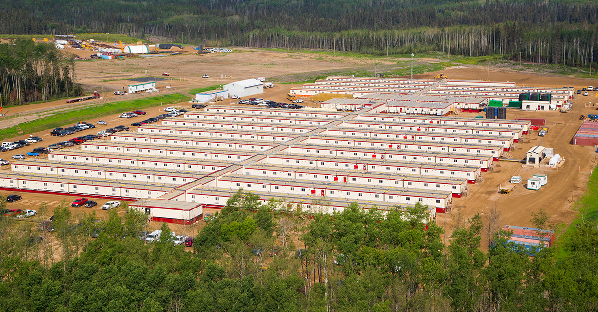 Large remote workforce lodging camp with modular units, representing crew accommodation for industrial projects