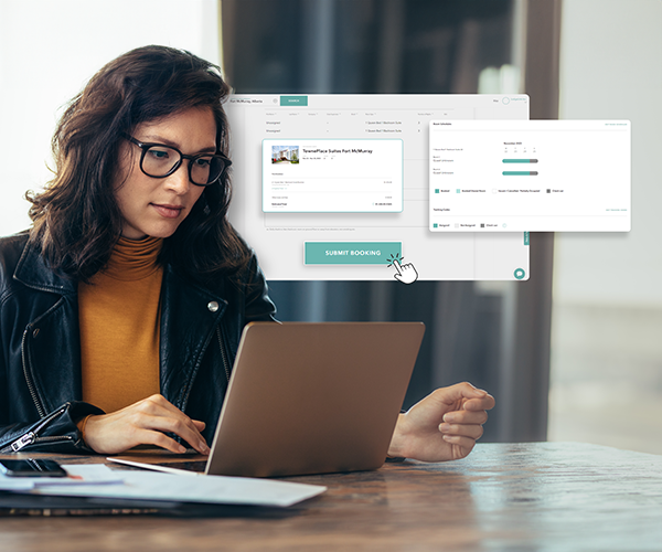 A woman using a laptop with LodgeLink’s booking interface overlaid, showcasing an easy-to-use platform for workforce accommodation management.