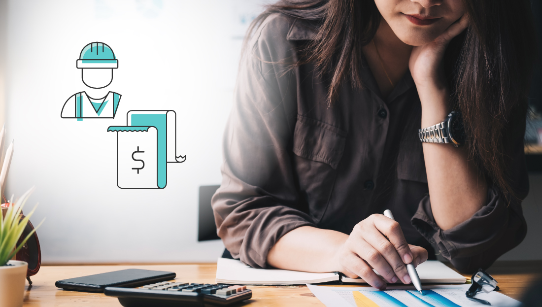 A person sitting at a desk writing on a paper looking at workforce travel costs 