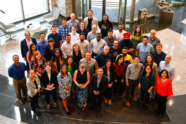 A group LodgeLink employees standing together for a photo
