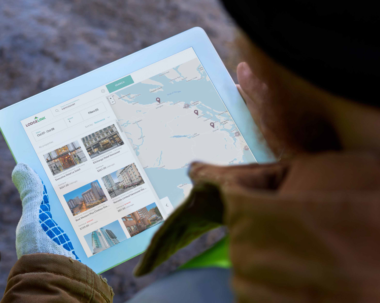 A close-up of a person looking at a map on a workforce travel site