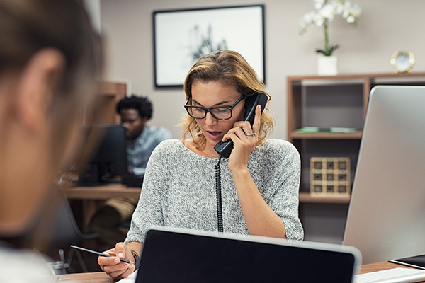 A person on the phone. 