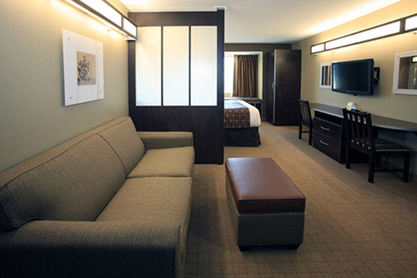 A bedroom view of Microtel Inn & Suites Wheeling.
