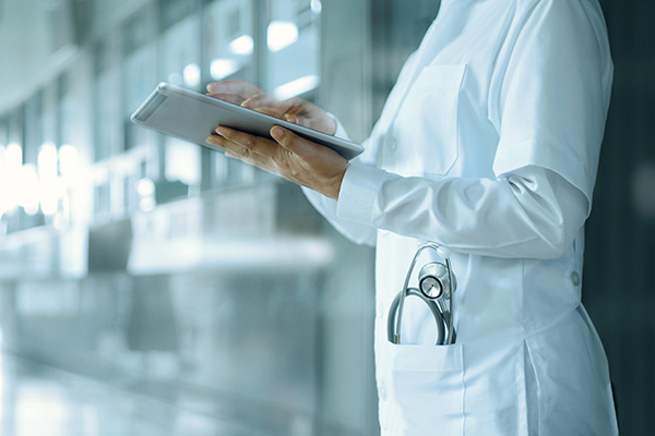 Nurse on iPad.